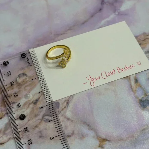 Gold color adjustable 4 leaf clover ring, about a size 7. NEW. Adjustable. - Picture 3 of 5